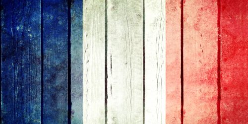France wooden grunge flag. Turkey flag painted on the old wooden planks. Vintage retro picture from my collection of flags.