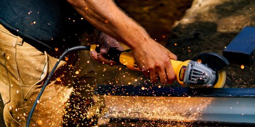 A craftsman cutting metal and welding